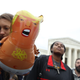 Protesters rally in front of the U.S. Supreme Court as arguments are heard in a set of cases concerning the rights of LGBTQ people in the workforce, in Washington, D.C.